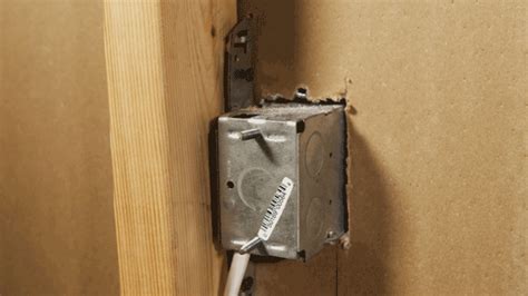 loose electrical box in brick wall|loose electrical outlet box.